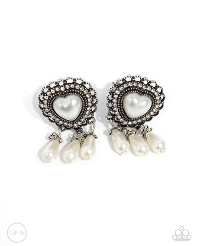 Sumptuous Story - White Clip-On Earring