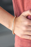 Seven Figure Fabulous - Gold Bracelet